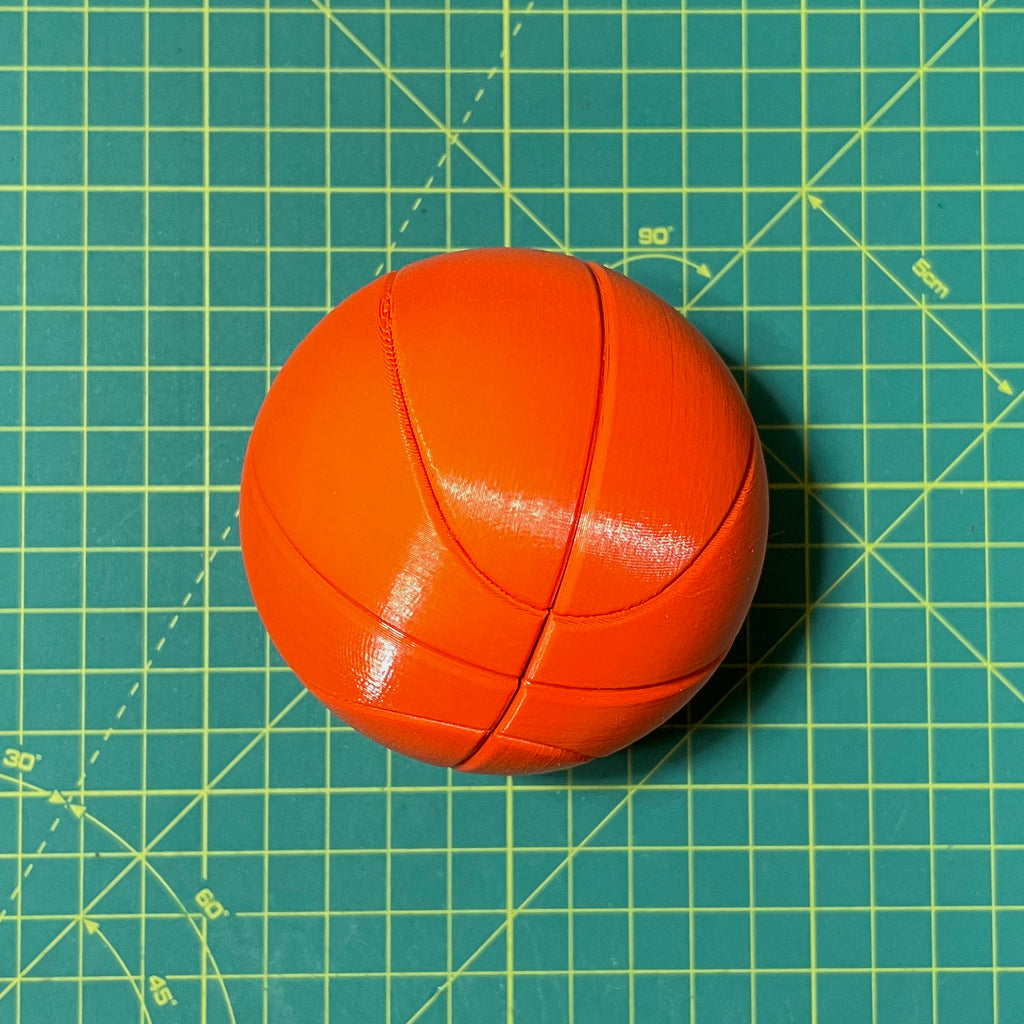 Puzzle esférico 3D BKT de 7,5 cm en naranja flúor, armado
