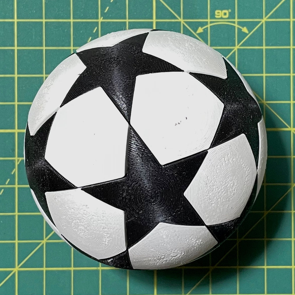 Puzzle esférico 3D CHL de 7,5 cm en blanco + negro, en primer plano