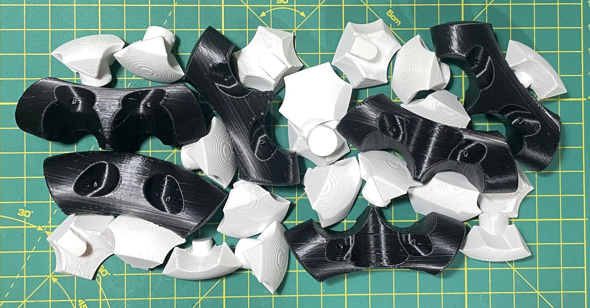 Puzzle esférico 3D KNT de 7,5 cm en blanco + negro, con las piezas sueltas