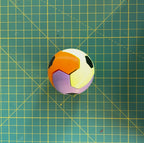 Puzzle esférico 3D LKY mini de 5 cm en naranja + amarillo flúor + violeta + negro + blanco, armado