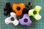 Puzzle esférico 3D LKY mini de 5 cm en naranja + amarillo flúor + violeta + negro + blanco, con las piezas sueltas