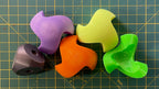 Puzzle esférico 3D LUK de 5 cm en naranja + amarillo flúor + verde + violeta + gris oscuro, con las piezas sueltas