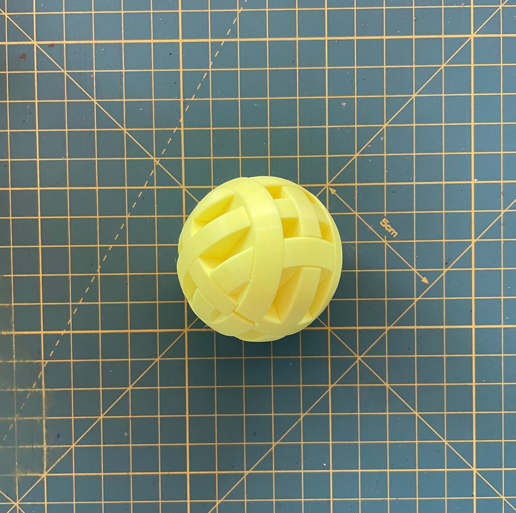 Puzzle esférico 3D ORT mini de 5 cm en amarillo flúor, armado