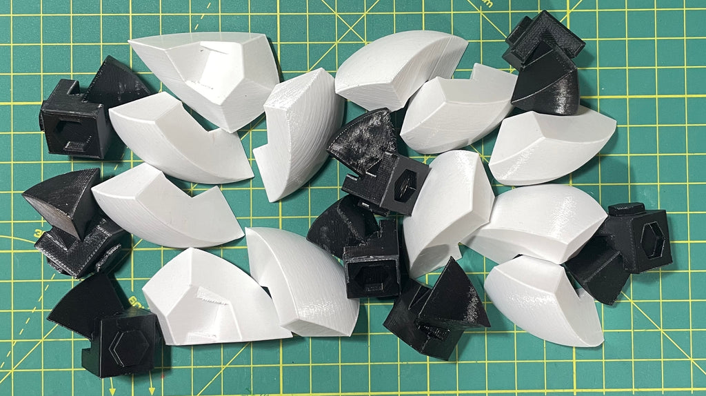 Puzzle esférico 3D QTR de 7,5 cm en blanco + negro, con las piezas sueltas