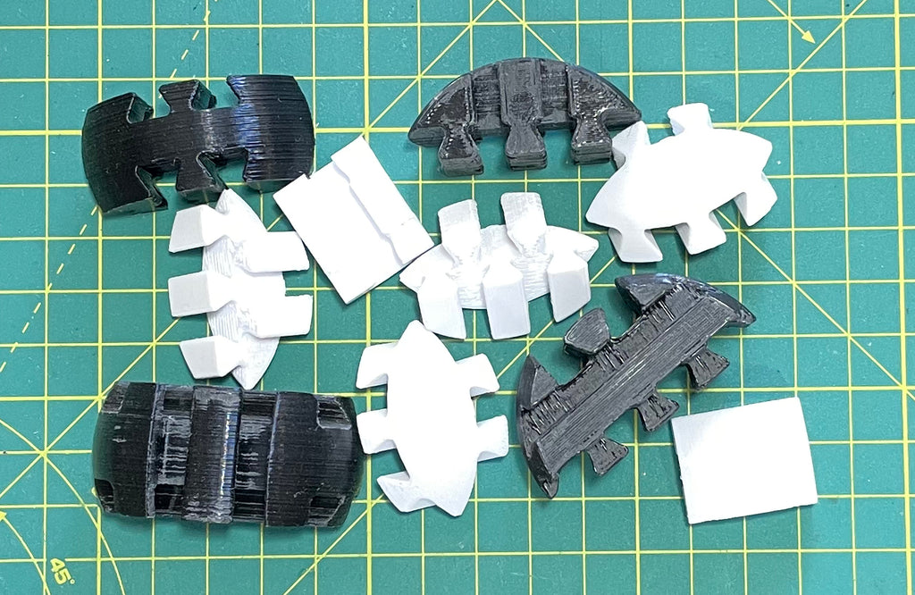 Puzzle esférico 3D SKV mini de 5 cm en blanco + negro, con las piezas sueltas