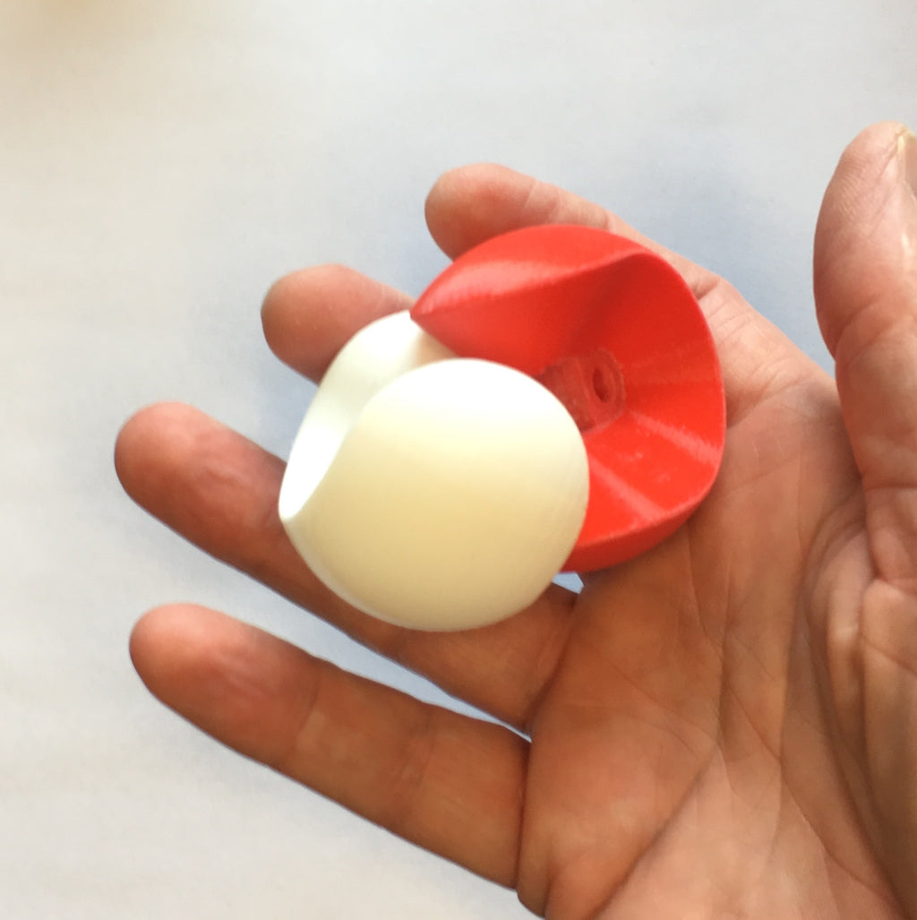Puzzle esférico 3D SWG de 5 cm en blanco + rojo, con las piezas sueltas