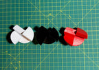 Puzzle esférico 3D TRI de 5 cm en blanco + rojo + negro, con las piezas sueltas