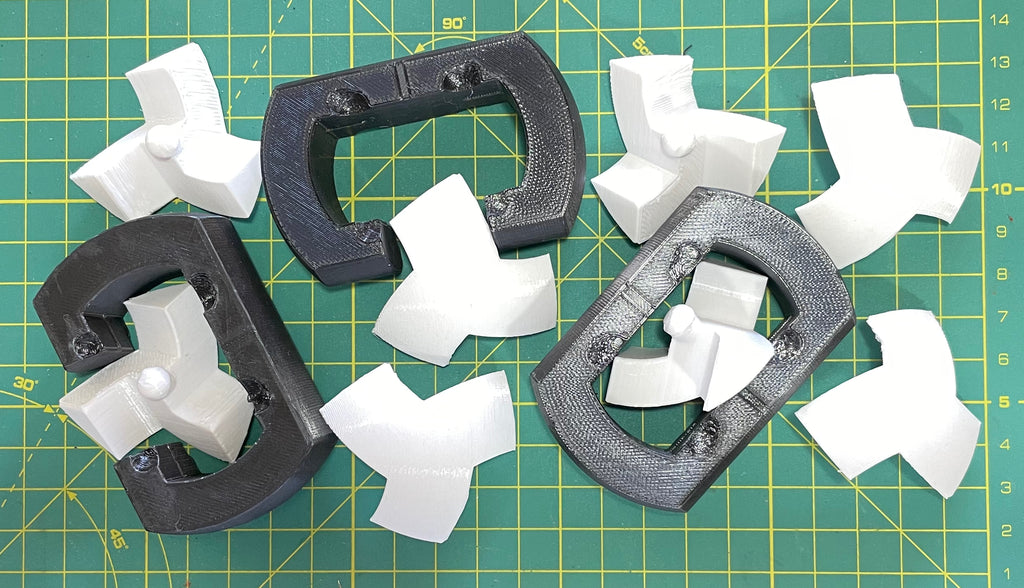 Puzzle esférico 3D TRQ de 7,5 cm en blanco + negro, con las piezas sueltas